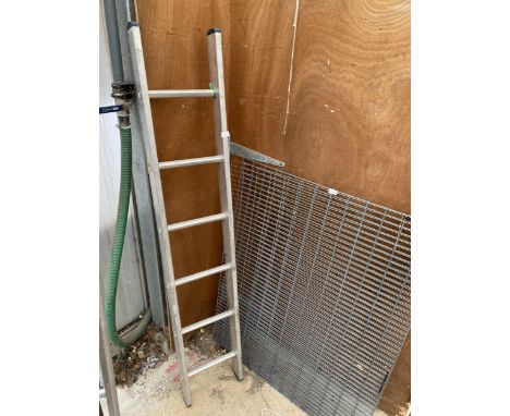 A SIX RUNG ALUMINIUM LADDER 