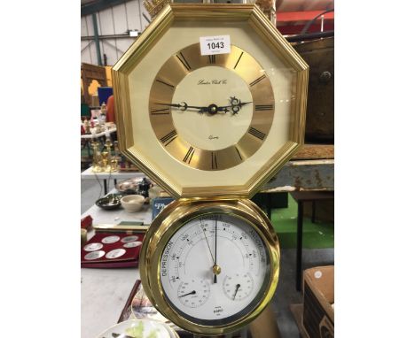 AN OCTAGONAL WALL CLOCK PLUS A BRASS STYLE ROUND BAROMETER 