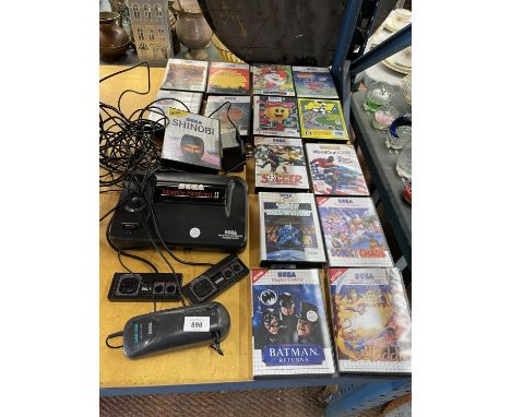 A VINTAGE SEGA MASTER SYSTEM 11 WITH TWO CONTROLLERS PLUS A QUANTITY OF GAMES TO INCLUDE SONIC THE HEDGEHOG, SUPER SPACE INVA