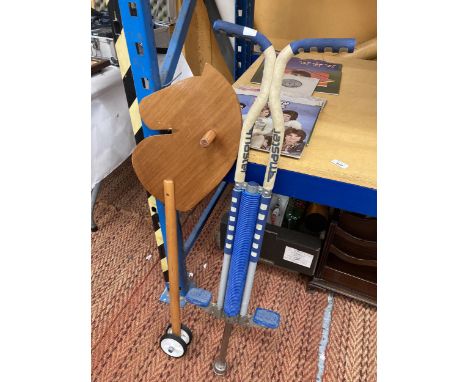 TWO ITEMS - MASTER POGO STICK AND CHILD'S HORSE ON WHEELS 