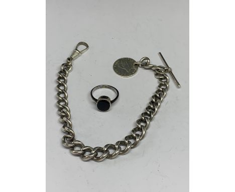 A HEAVY SILVER HALF ALBERT WATCH CHAIN WITH A 1976 ISLE OF MAN HALF PENNY AND A SILVER RING WITH BLACK STONE SIZE J/K 
