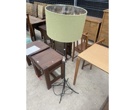 A MODERN WROUGHT IRON STANDARD LAMP COMPLETE WITH SHADE 