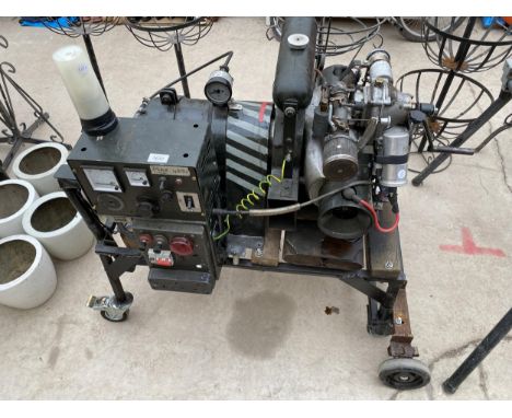 A CRANK HANDLE ENGINE PETROL GENERATOR 