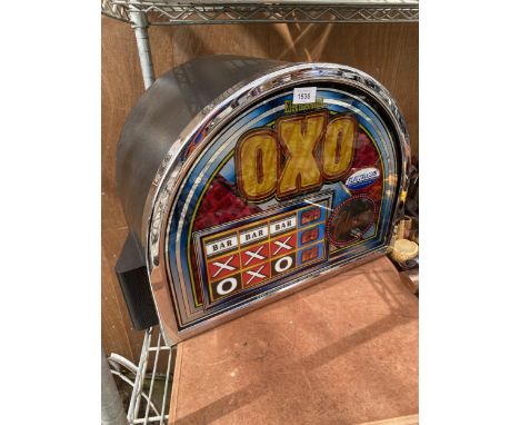 THE TOP SECTION OF A FRUIT MACHINE CONVERTED TO BE A LIGHT BOX 