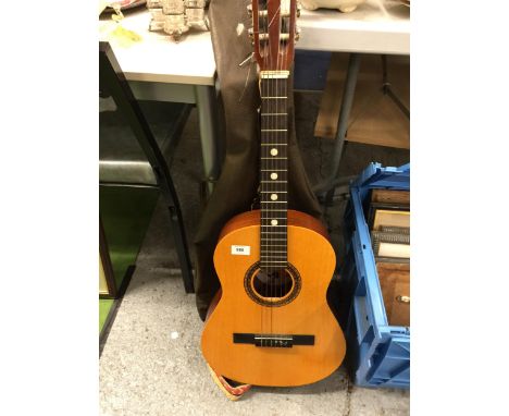 A CHILD'S 'INFANTE' ACCOUSTIC GUITAR WITH CASE 