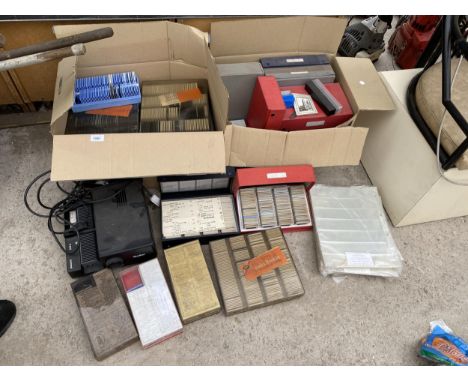 A ROLLEI PROJECTOR AND AN ASSORTMENT OF SLIDES 