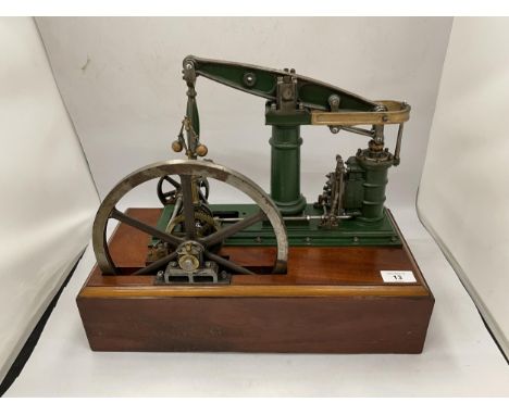 A VINTAGE STATIONARY STEAM ENGINE WHICH CAN RUN OFF COMPRESSED AIR OR STEAM 
