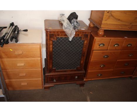 A cupboard with fitted speaker 