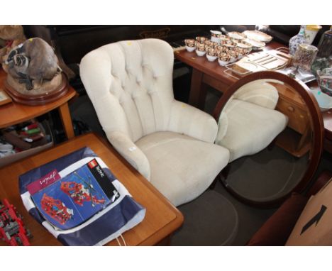 A button back upholstered nursing chair