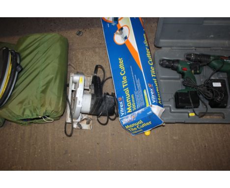 A Stihl saw and a manual tile cutter