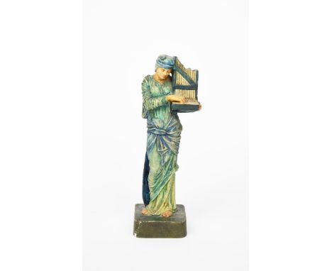 Saint Cecilia a Compton Pottery The Potters' Arts Guild figure designed by Mary Seton Watts, modelled standing playing a hand