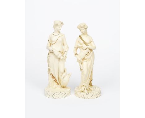 A pair of tall W H Goss pottery Classical female figures,  one modelled holding a lamb, the other Leda and the Swan,  modelle
