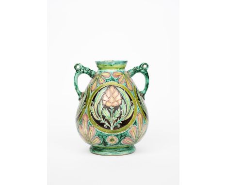 A large Della Robbia Pottery vase by John Fogo,  swollen ovoid form with tapering neck and everted rim, applied dolphin handl