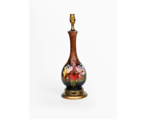 'Flambe Frilled and Slipper Orchids' a Moorcroft Pottery vase lamp base designed by William Moorcroft,  ovoid with slender ne