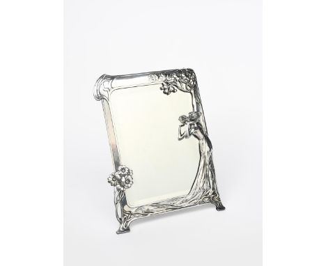 An Art Nouveau WMF desk mirror, shaped, rectangular form, cast in relief with an Art Nouveau maiden looking at her reflection