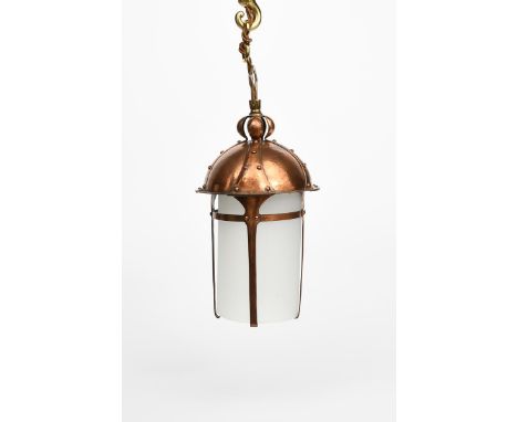 A patinated copper hall lantern,  the domed hammered top with rivet panel decoration, four straps with hook terminals support