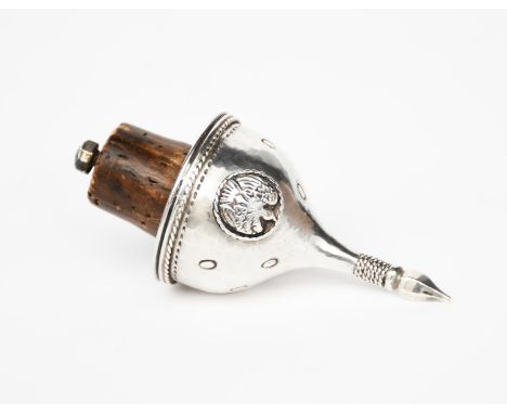 A silver bottle top attributed to the Artificers Guild, domed form with tall shaped finial, with wire rope bands, applied wit