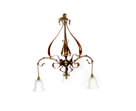 An Art Nouveau copper and brass  three branch ceiling light,  three copper foliate arms, with frosted glass bell shades, unsi