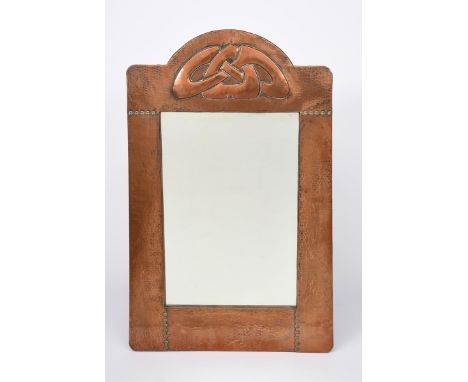 A Liberty &amp; Co copper wall mirror designed by Archibald Knox, tapering rectangular form with stamped Celtic entrelac pane