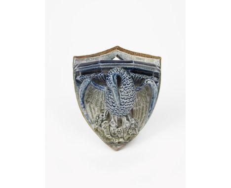 An early Martin Brothers Pottery stoneware wall vesta by Robert Wallace Martin, dated 1877, modelled as a Pelican in Her Piet