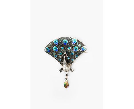 A fine Guild of Handicraft silver and enamel peacock brooch designed by Charles Robert Ashbee,  wirework feathers with enamel