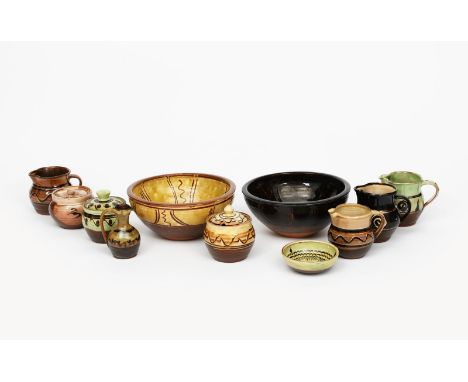 Sidney Tustin (born 1914) a Winchcombe Pottery bowl, combed column design, glazed mustard yellow, another similar and a colle