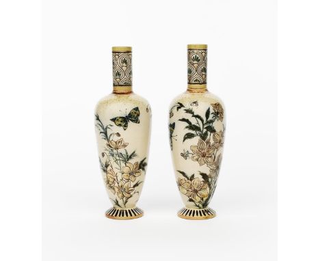 A pair of Martin Brothers stoneware bottle vases by Robert Wallace Martin, dated 1885, slender, shouldered form with cylindri