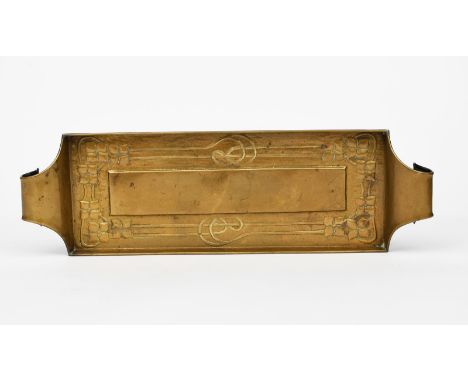 A Glasgow School patinated brass twin-handled tray,  rectangular, stamped in low relief with Art Nouveau flowers on long sinu