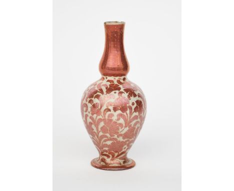 A William De Morgan solifleur vase, footed ovoid form with swollen cylindrical neck, painted with carnation flowers in ruby l