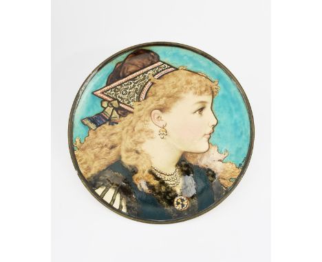 A Mintons wall plate by Rebecca Coleman, dated 1876, painted with a portrait of a young girl wearing a pearl necklace, in col