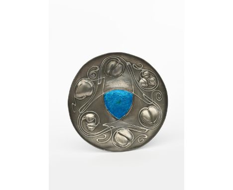 A Liberty &amp; Co English Pewter and enamel Bollelin dish designed by Archibald Knox, model no. 044, circular, cast in relie