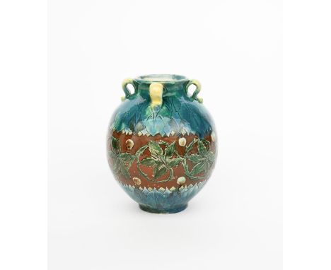 A Della Robbia Pottery vase probably by Elizabeth Beckett,  ovoid footed form with applied loop handles to shoulder, incised 