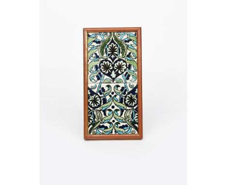 A William De Morgan New Persian no.2 two tile panel, painted in shades of blue, turquoise green and aubergine, framed marks c