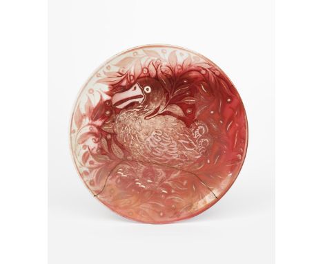 A William De Morgan Dodo wall plate, painted with a dodo bird perched amongst berried foliage in ruby on a white ground, unsi
