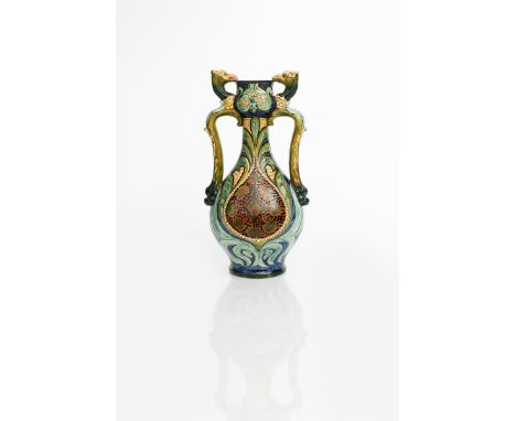 A Della Robbia Pottery twin-handled vase by Lizzie Wilkins, dated 1901, the ovoid vase with  tapering neck and swollen top ri