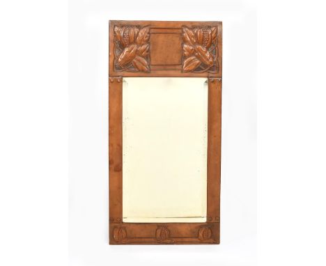 A tooled leather wall mirror by Beatrice Goodwin and Madge Weeks,  the rectangular frame with tooled split pomegranate panel 