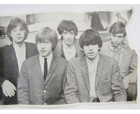 Signed publicity poster of the Rolling Stones, signed in blue pen by Brian Jones, Keith Richards and Charlie Watts, image tak