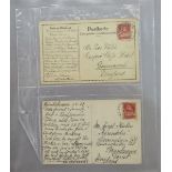 Swiss stamps: Two large stock-books & postcard album. Brown stockbook contains definitives,