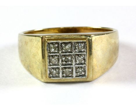 A gentleman's 9ct yellow gold diamond set signet ring (R).