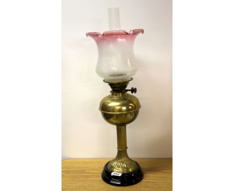 An Edwardian brass oil lamp, H. 65cm.