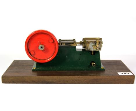 A live steam wood mounted horizontal steam engine, L. 36cm.