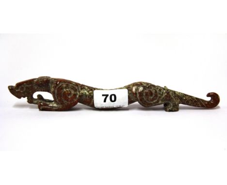 An unusual Chinese carved mixed coloured jade / hardstone brush rest in the form of a dragon, L. 24cm.