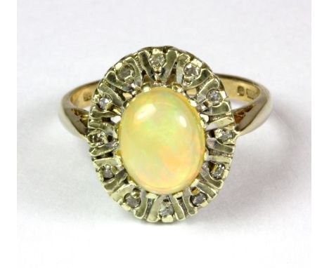 A 9ct yellow gold opal and diamond cluster ring (M).