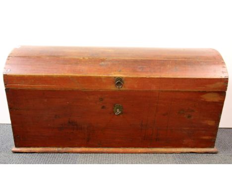 A Victorian dome topped pine trunk with working lock, W. 109cm, Depth. 54cm.