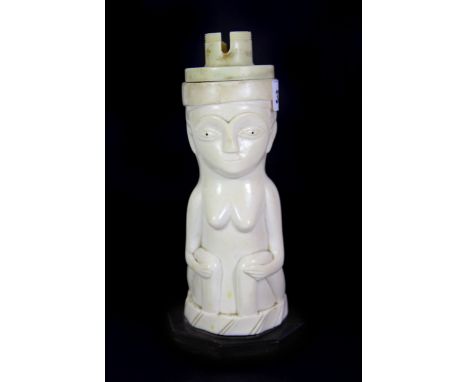 An early 20th century African carved ivory figure mounted in the 1920's as a lamp base, L. 19cm.