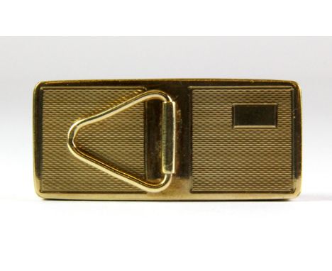 An unusual 9ct gold engine turned box with carrying handle, 4.5 x 2 x 1cm. Weight approx 17.5 grams