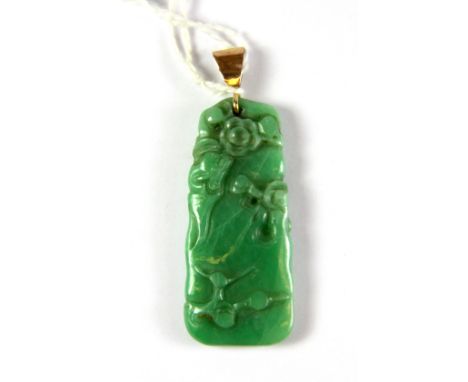 A superb 18th century yellow metal mounted Chinese apple green jade pendant decorated with blossom over rocks, L. 5cm. Prov. 