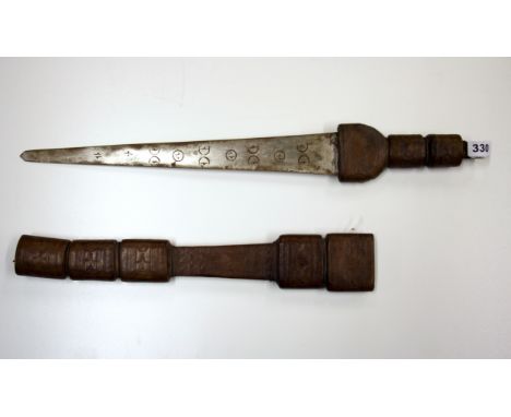 An eastern sword with decorated steel blade and embossed leather hilt and scabbard, L. 61cm.