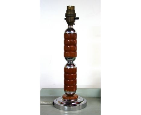 An Art Deco chrome and amber coloured Lucite table lamp base, H. 30cm.