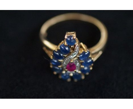 9ct Gold ring set with blue &amp; red stones 